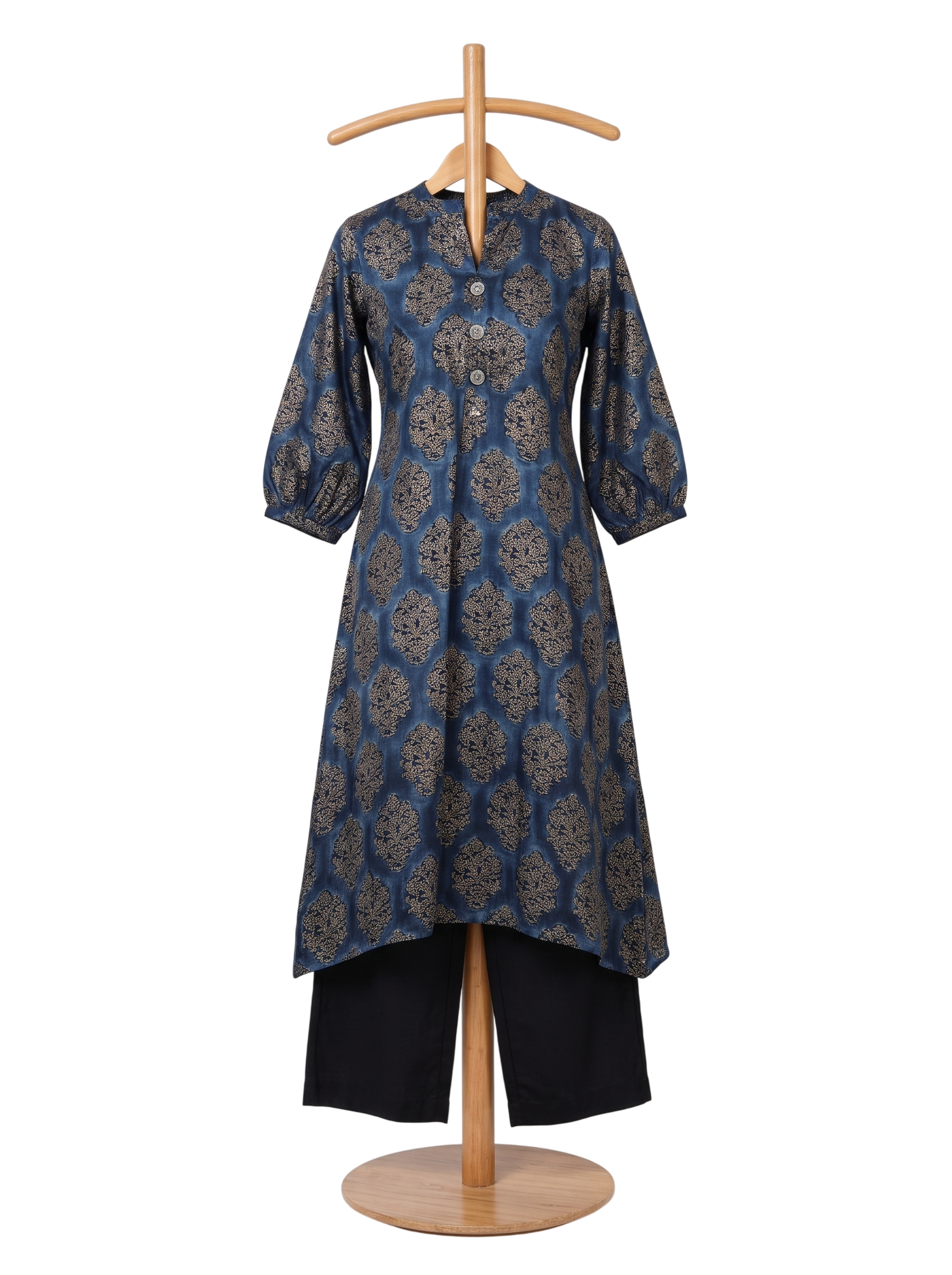 Kurta in indigo printed modal silk with gold motifs, displayed on a wooden stand