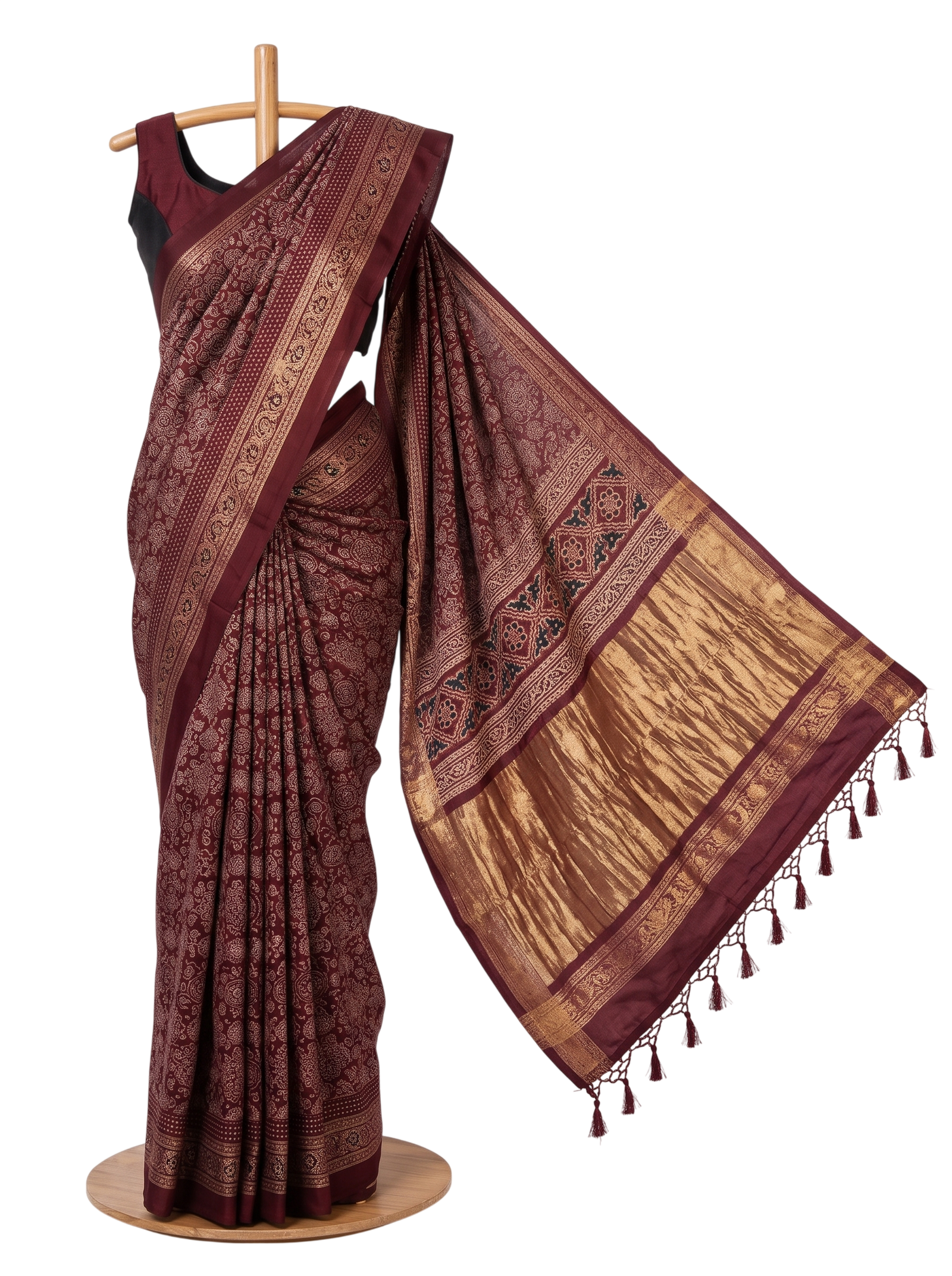 Lakdi Pallu modal silk saree in wine red with a block-print jaal and broad tissue-zari pallu, draped on a stand